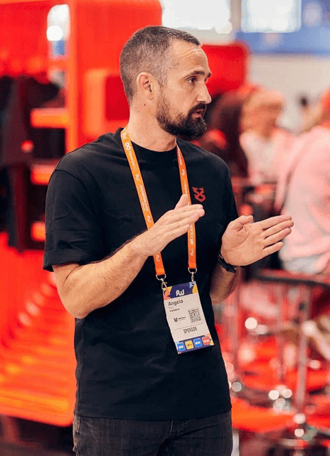 Angelo Roic speaking at a conference